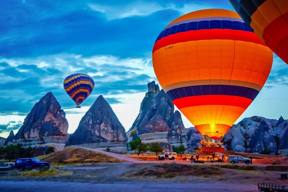 Hot air balloon over Cappadocia at sunrise x2
